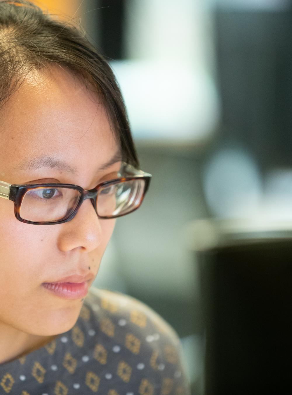 Woman working at a computer