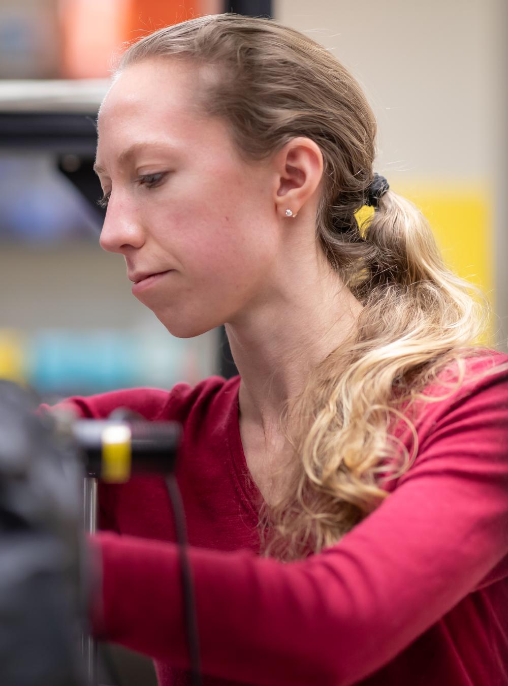 Genevieve Clark working in the Quantum Lab