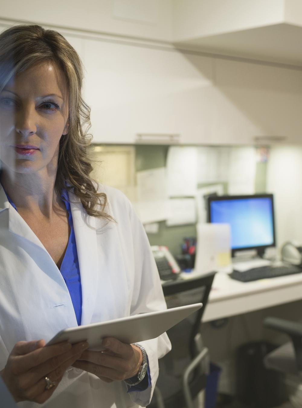 Doctor holing a tablet conducting medical research