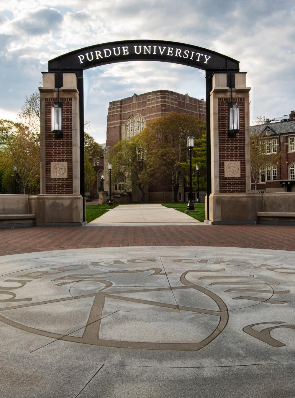 The archway at Purdue University leading onto campus