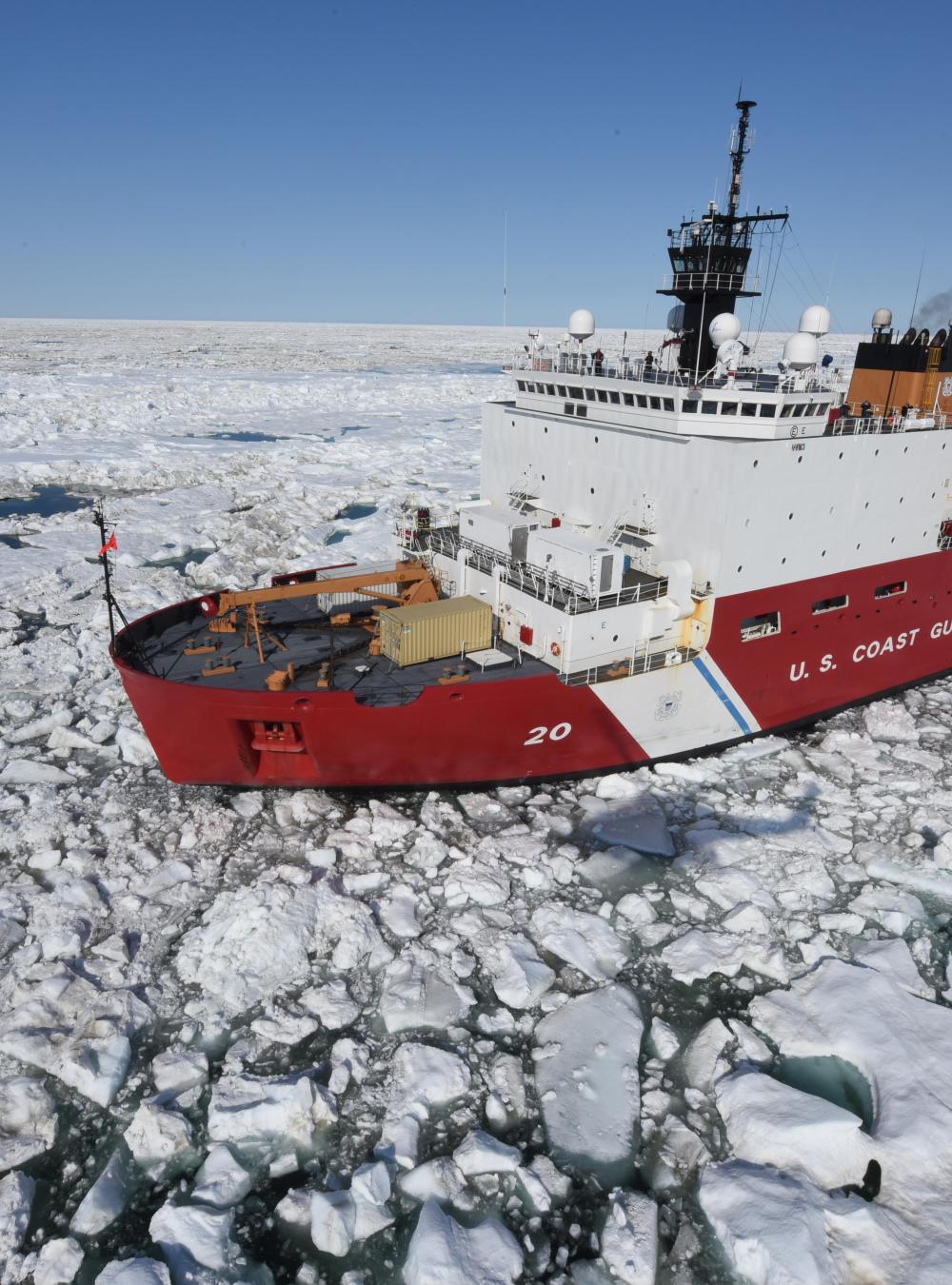 U.S. Coast Guard ice breaker in the arctic surrounded by ice