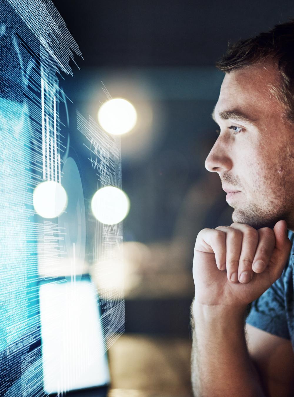 Man reviewing digital data using the cloud