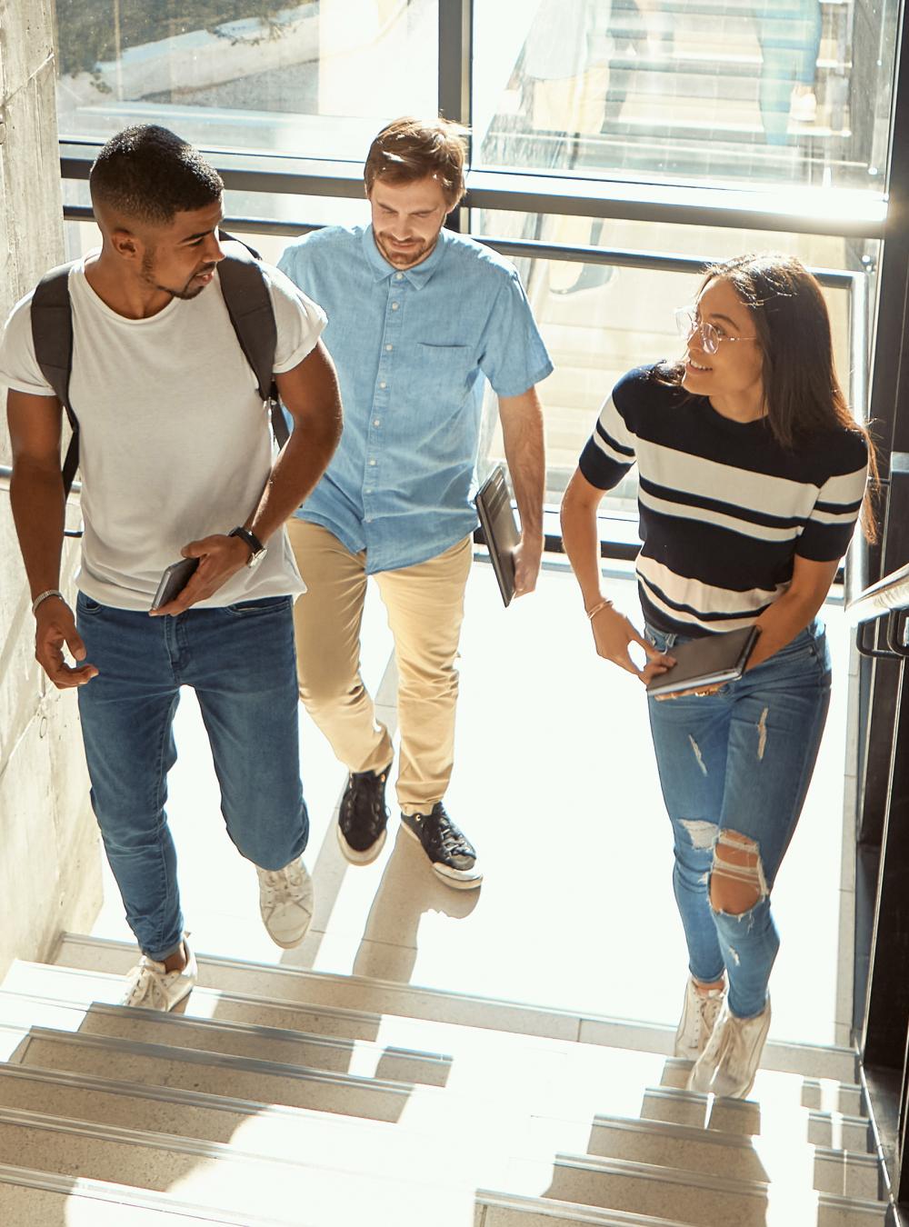 Students walking up a stairwell