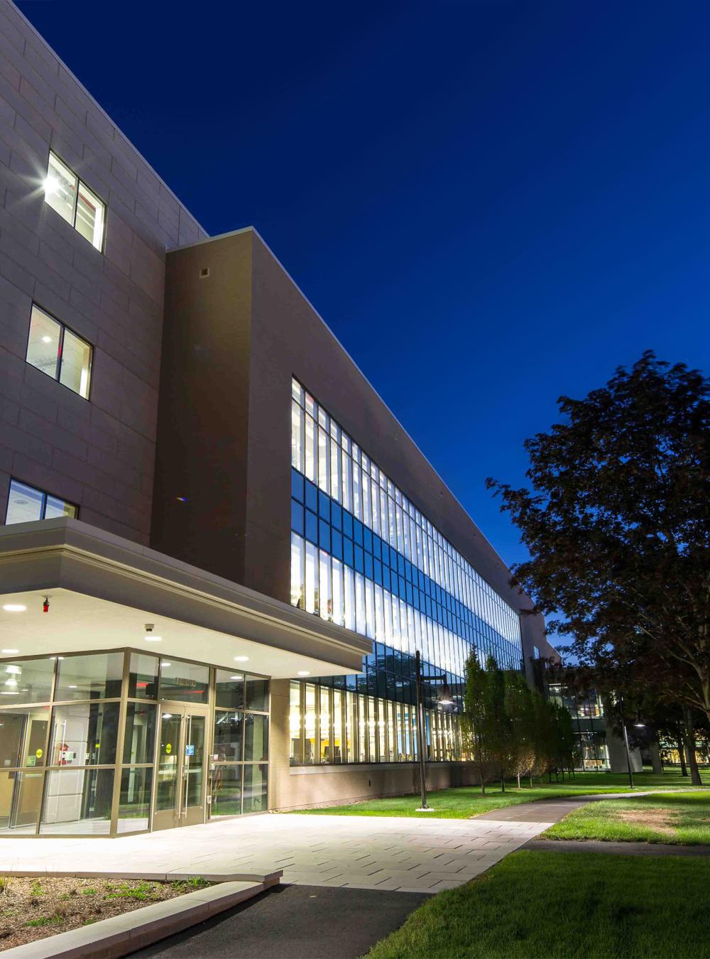 Outside E Building in Bedford at night