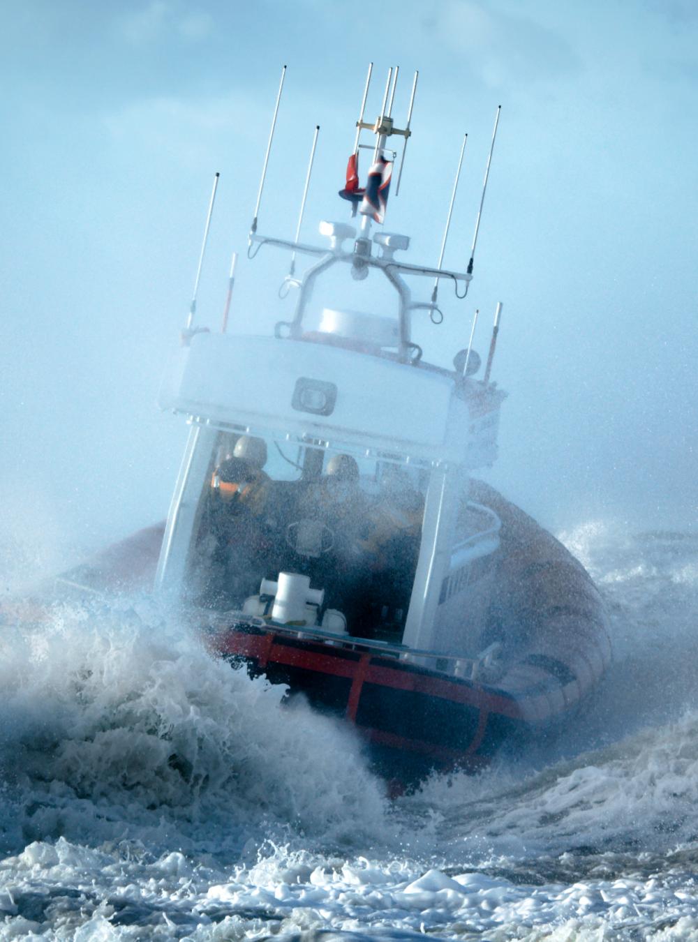 Coast Guard ship during storm in ocean