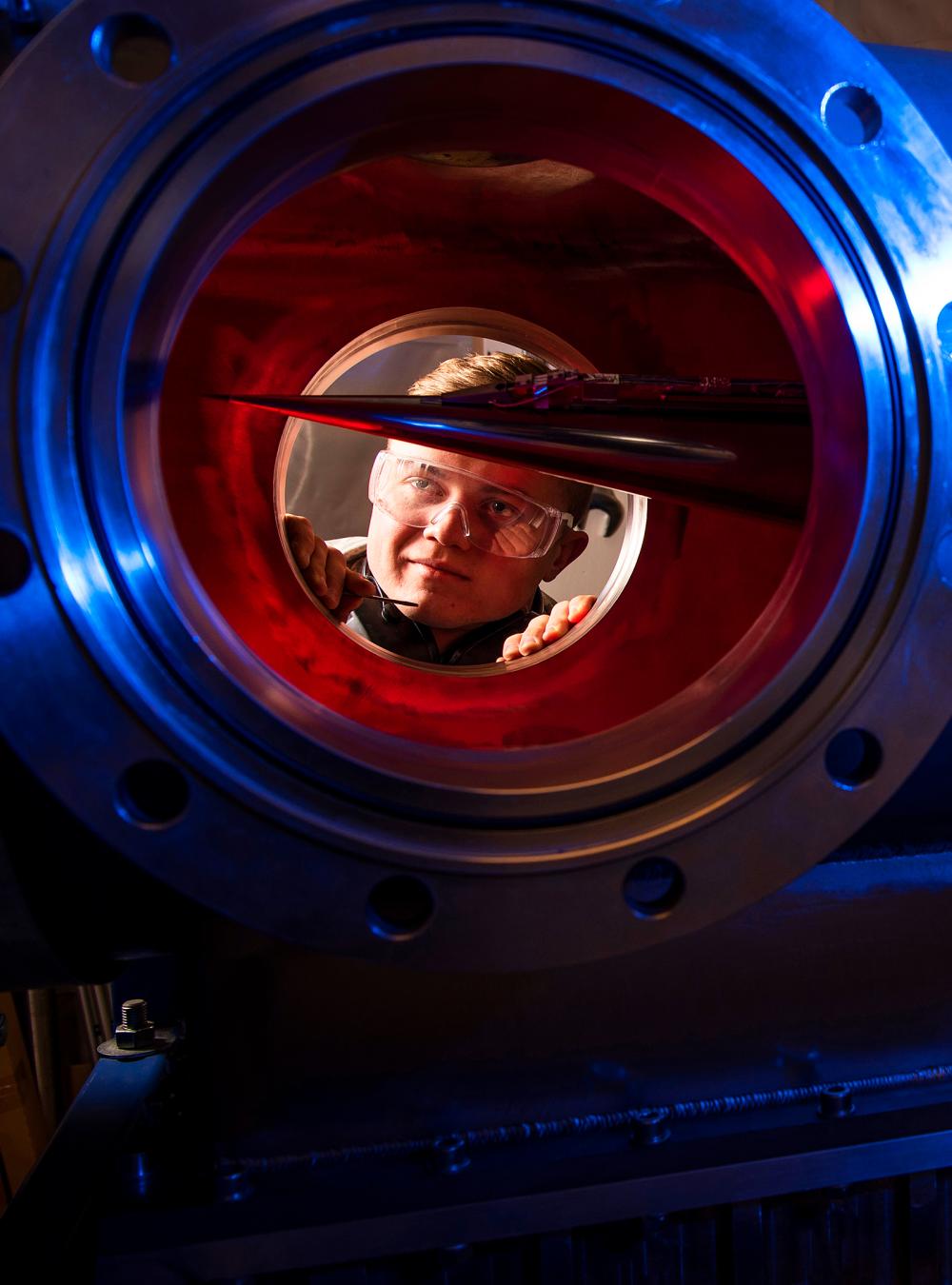 Air Force Cadet 2nd Class Eric Hembling uses a Ludwieg Tube to measure the pressures, temperatures and flow field of various basic geometric and hypersonic research vehicles