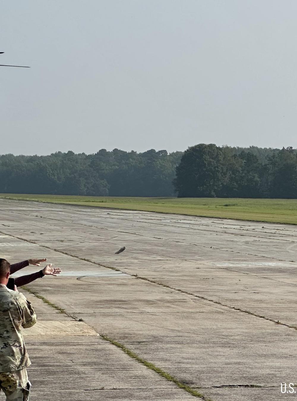 Drone launch in front of a helicopter