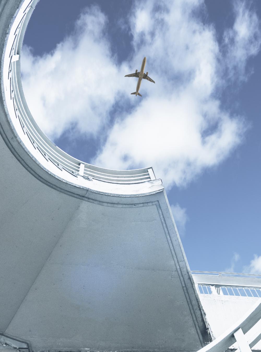 Jet flying above a spiral staircase