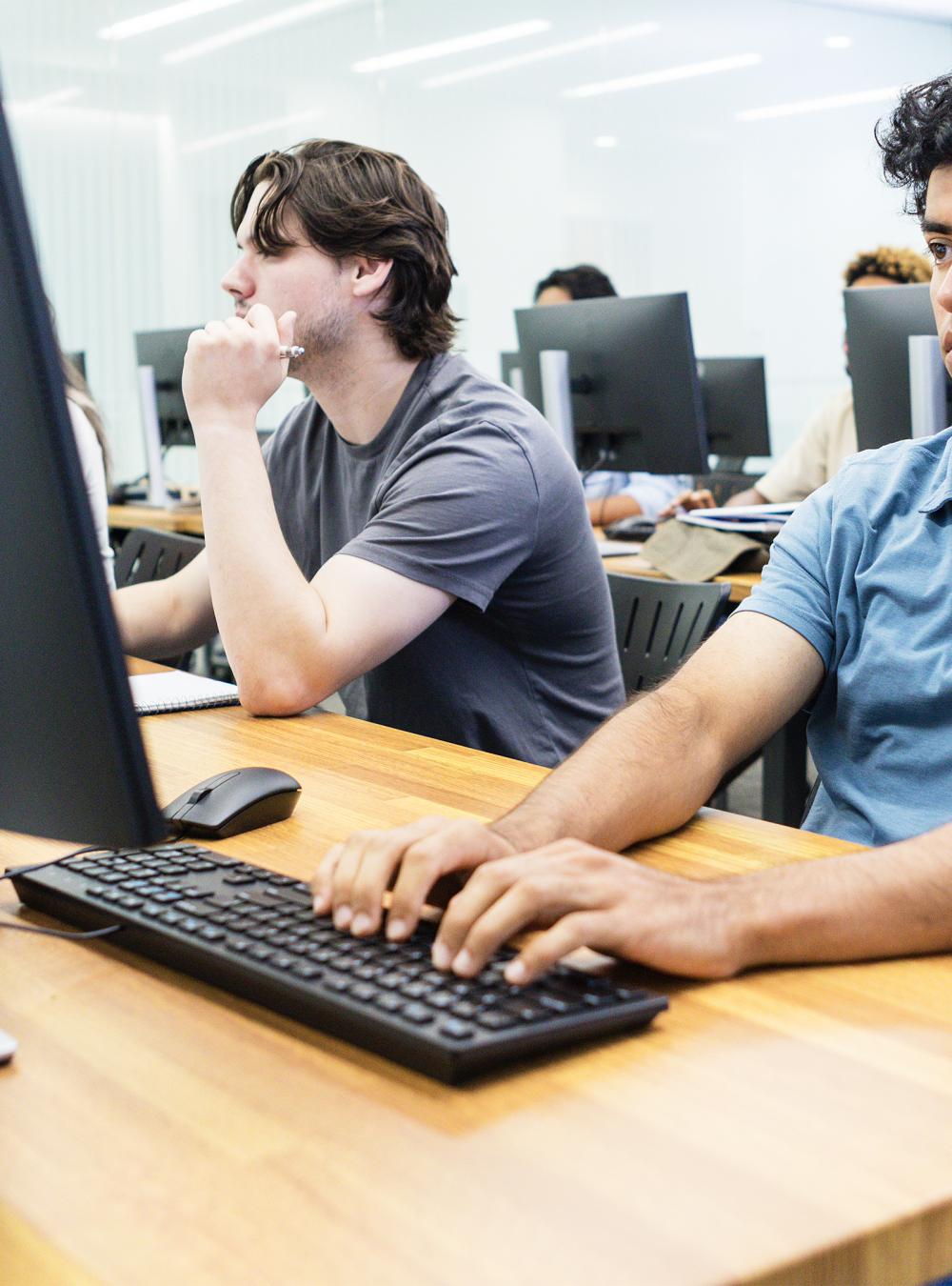 High school students working in a computer lab