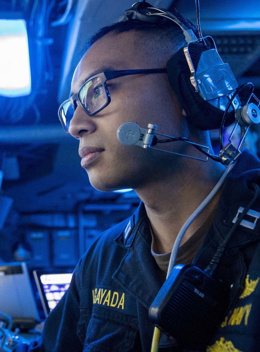 Navy Lt. works in the command center aboard the USS John P. Murtha