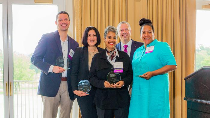 Stephanie Turner receiving the NOVA Chamber Impact Award