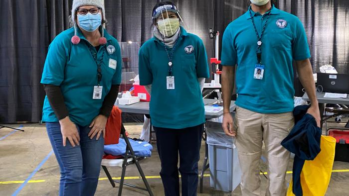 MITRE’s Loudoun Medical Reserve Corps volunteers Fran Stites, Rose Almonte, and Armaan Mehta