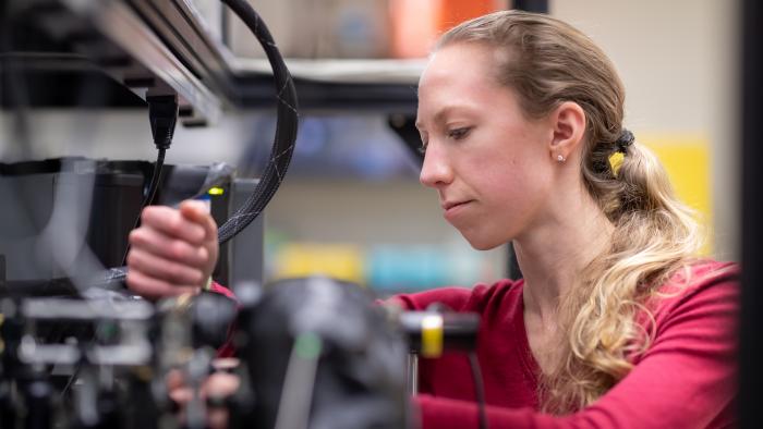 Genevieve Clark working in the Quantum Lab