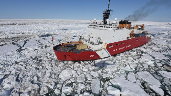 U.S. Coast Guard ice breaker in the arctic surrounded by ice