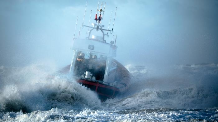 Coast Guard ship during storm in ocean