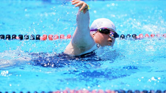 A swimmer in action in a pool