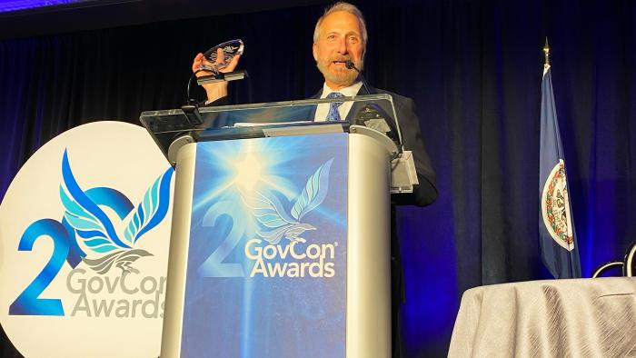 Jason Providakes accepting his GovCon award