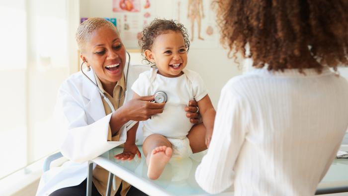 mother and daughter in doctors office