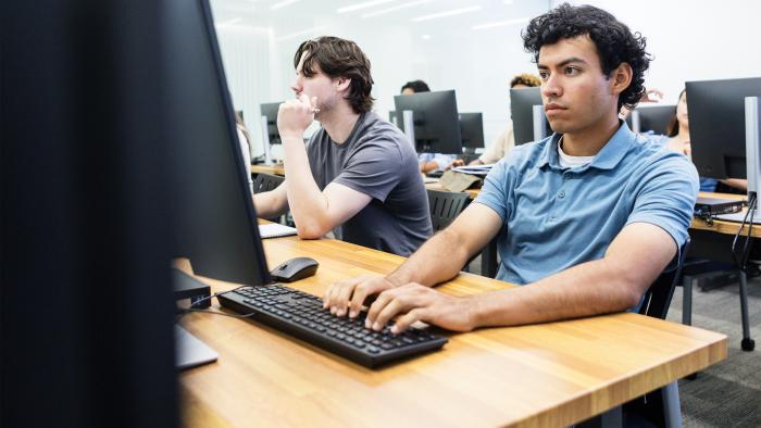 High school students working in a computer lab