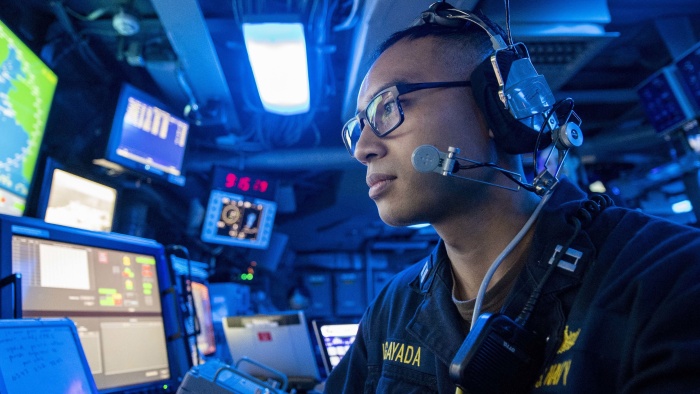 Navy Lt. works in the command center aboard the USS John P. Murtha