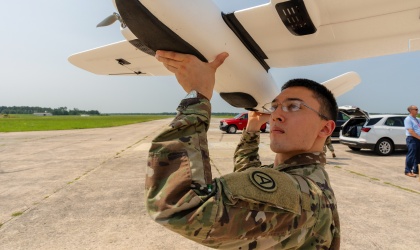 Soldier holding a drone