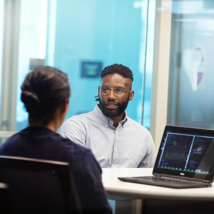 Two employees working in an office