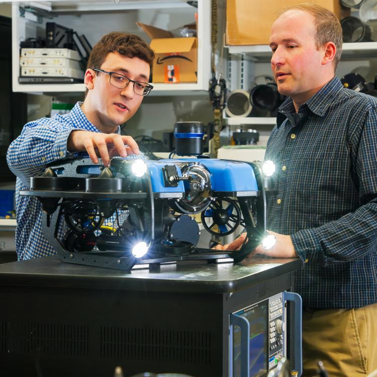 Employees working in the BlueTech lab